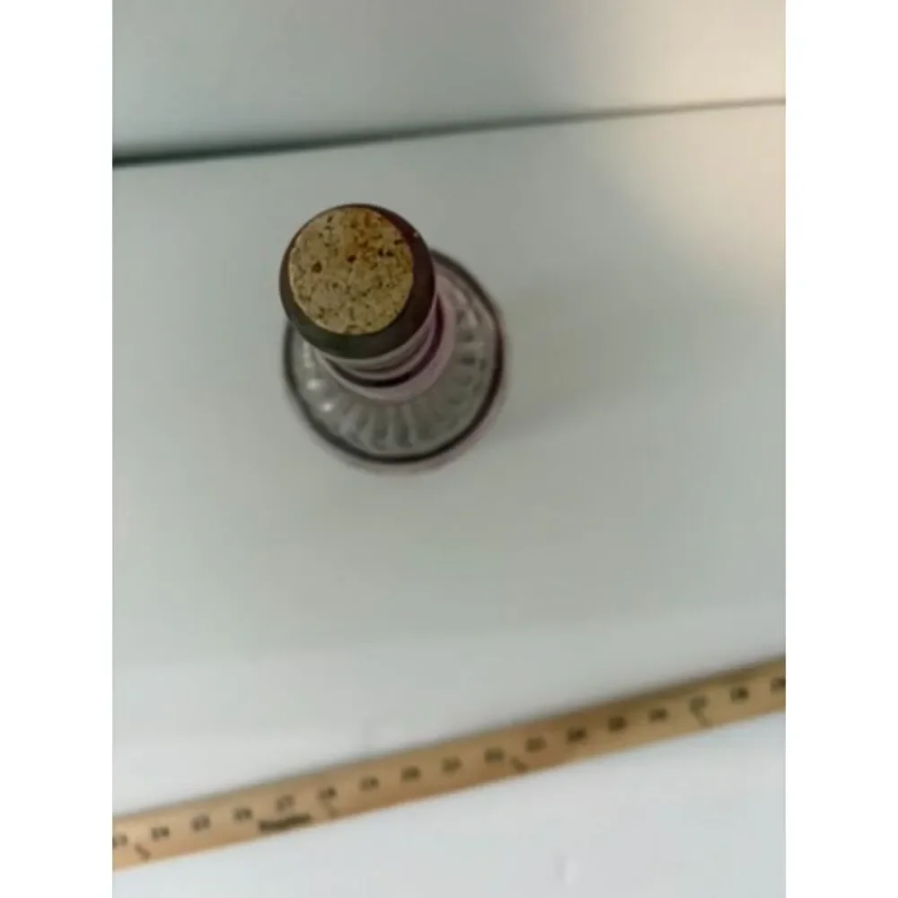 vtg Purple glass bottle with cork stopper ribbed design